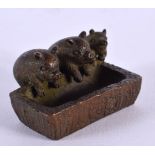 A JAPANESE THREE PIG BRONZE OKIMONO. 4.5 cm x 3.5 cm.