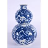 A CHINESE BLUE AND WHITE DOUBLE GOURD VASE 20th Century. 14 cm high.