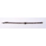 A STERLING SILVER BRACELET SET WITH PASTE GEMS. Stamped Sterling, 19cm long, weight 20g