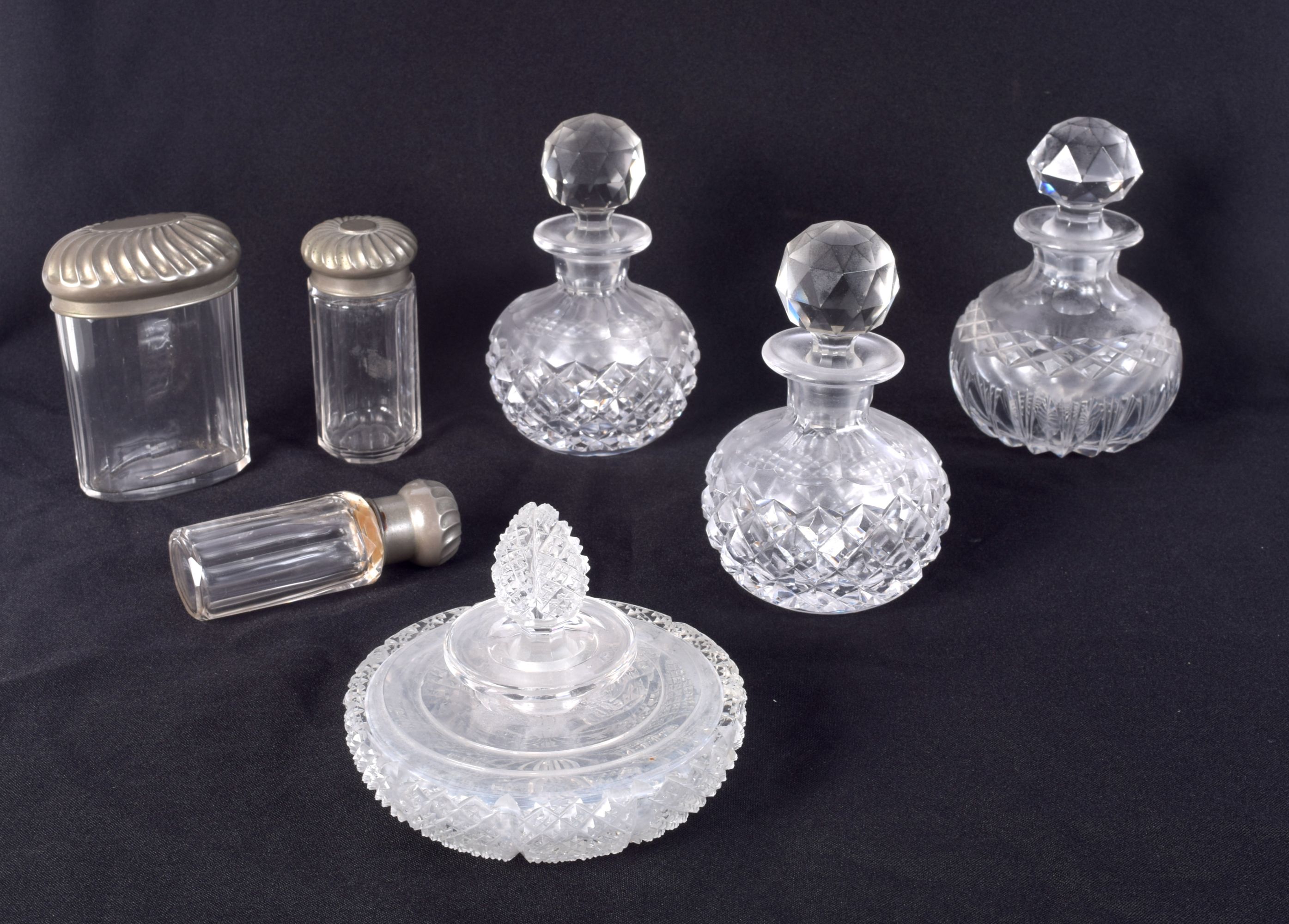 A collection of vintage glass scent bottles and cosmetic pots (7) largest 14cm.