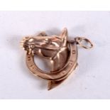 A 9CT GOLD HORSE PENDANT. 1.9 grams. 2.5 cm x 2 cm.