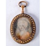 AN ANTIQUE 18CT GOLD PORTRAIT PENDANT. 20 grams. 5.5 cm x 3.5 cm.