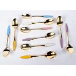 EIGHT DANISH SILVER GILT AND ENAMEL SPOONS. 92 grams. 9 cm x 1.75 cm. (8)