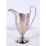 A VICTORIAN SILVER HELMET SHAPED JUG. 124 grams. 14 cm x 11 cm.