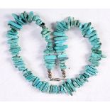 A TURQUOISE NECKLACE. 47 cm long.