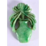 A CHINESE CARVED JADEITE FLOWER 20th Century. 9 cm x 5.75 cm.