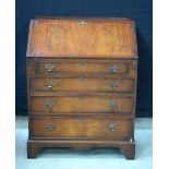 A 19th Century 4 drawer mahogany bureau 99 x 77 x 48 cm.