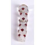 A Chinese carved glass dagger handle decorated with polished stones 9 cm.