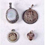 THREE SILVER PENDANTS. 12.5 grams. Largest 2 cm wide. (3)