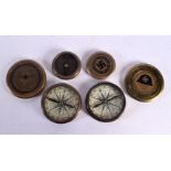 THREE CONTEMPORARY COMPASS. 7 cm diameter. (3)