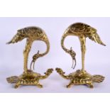 A PAIR OF 19TH CENTURY JAPANESE MEIJI PERIOD POLISHED BRONZE FIGURES modelled as birds upon minogame
