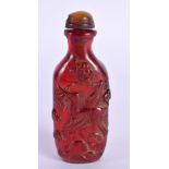 A CHINESE CARVED AMBER TYPE SNUFF BOTTLE 20th Century. 9.25 cm x 3.5 cm.
