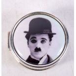 A SILVER CHARLIE CHAPLIN PILL BOX. 15 grams. 3 cm x 1.25 cm.