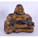 AN EARLY 20TH CENTURY CHINESE CARVED TIGERS EYE BUDDHA Late Qing/Republic. 4.5 cm x 6 cm.