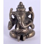 A RARE EARLY 20TH CENTURY MIDDLE EASTERN INDIAN SILVER FIGURE OF GANESHA. 85 grams. 4 cm x 2.75 cm.