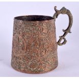 AN UNUSUAL 19TH CENTURY MIDDLE EASTERN MIXED METAL MUG decorated with scrolling foliage and vines. 1