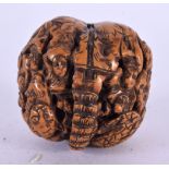 A LATE 19TH CENTURY CHINESE CARVED NUT. 4 cm wide.