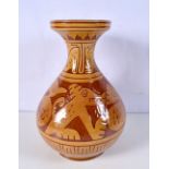 An Ecuadorian glazed terracotta vase 27 cm.