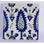 A MIDDLE EASTER TURKISH KUTAHYA TYPE POTTERY TILE. 21 cm square.