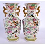 A PAIR OF 19TH CENTURY CHINESE TWIN HANDLED FAMILLE ROSE VASES Qing. 22 cm x 8 cm.