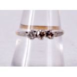 AN 18CT GOLD AND PLATINUM DIAMOND RING. 1.8 grams. N.