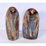 A pair of contemporary pottery penguins bearing a stamp JB monogram 38 cm (2).
