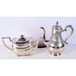 A LARGE VICTORIAN SILVER AND IVORY COFFEE POT together with an Edwardian silver teapot. London 1861