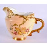 Royal Worcester jug of Empress shape painted with flowers on a blush ivory ground date mark 1897. 10