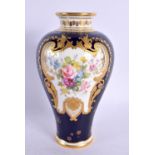 Royal Crown Derby vase painted with flowers in a raised gilt mirror shaped panel by G. Jessop, signe
