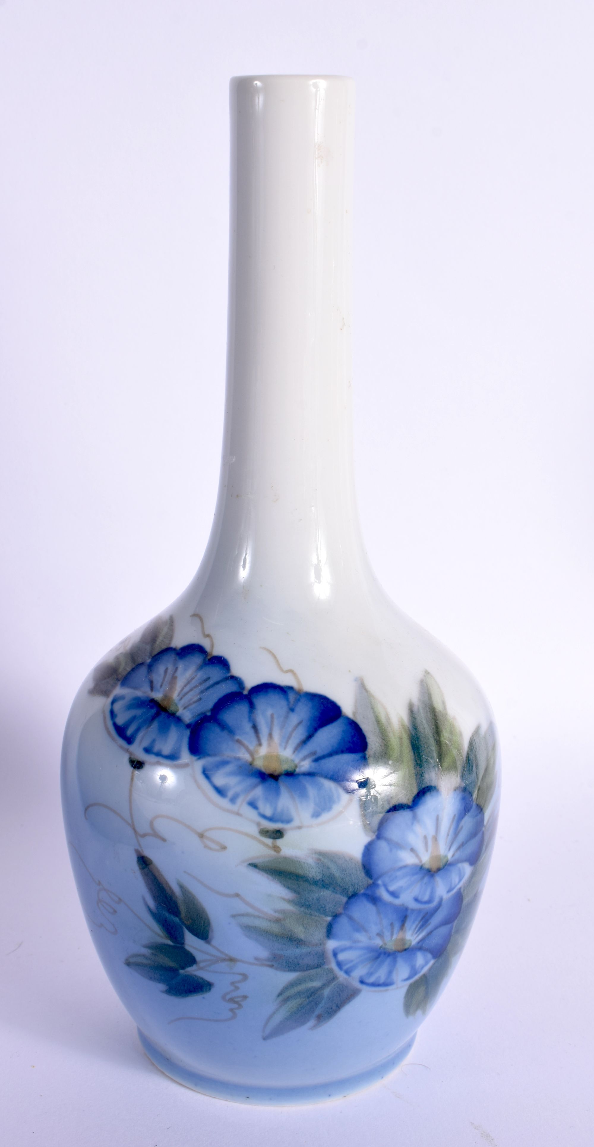 A DANISH ROYAL COPENHAGEN PORCELAIN VASE. 21 cm high.