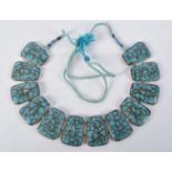 A VINTAGE TURQUOISE NECKLACE. 70 cm long.