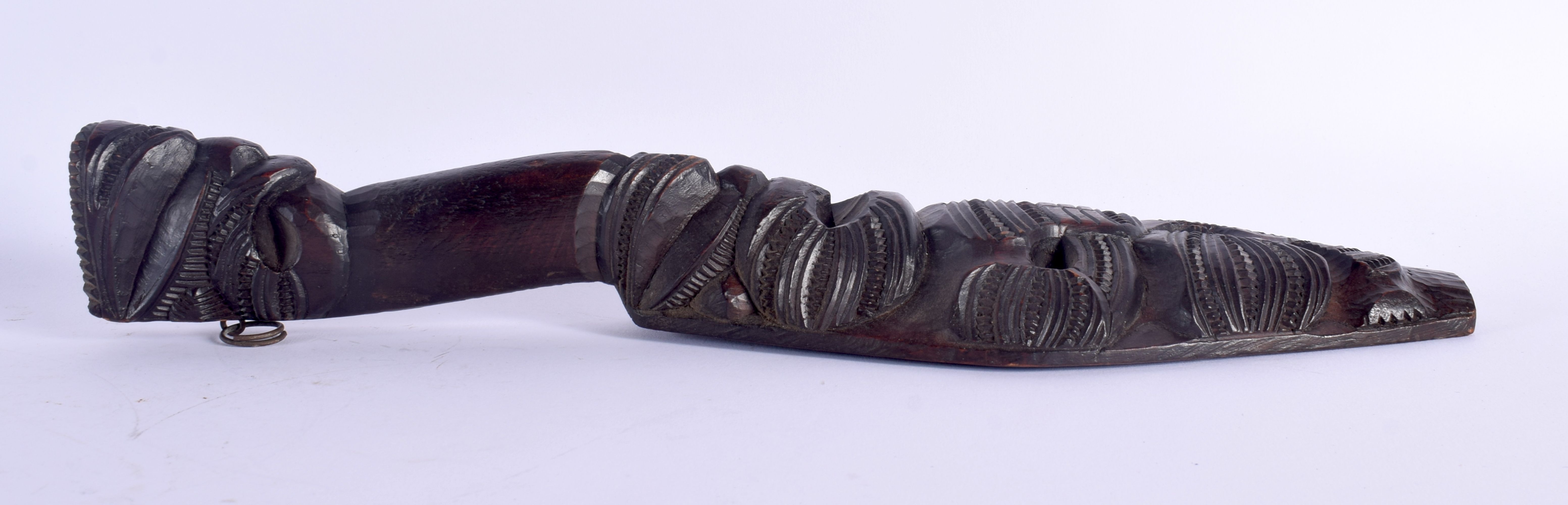 AN UNUSUAL EARLY 20TH CENTURY MAORI TRIBAL NEW ZEALAND CARVED WOOD CLUB possibly a Wahaiki, with fla - Image 9 of 22