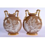 A FINE PAIR OF 19TH CENTURY ENGLISH PATE SUR PATE FLASKS Attributed to Minton, enamelled with foliag