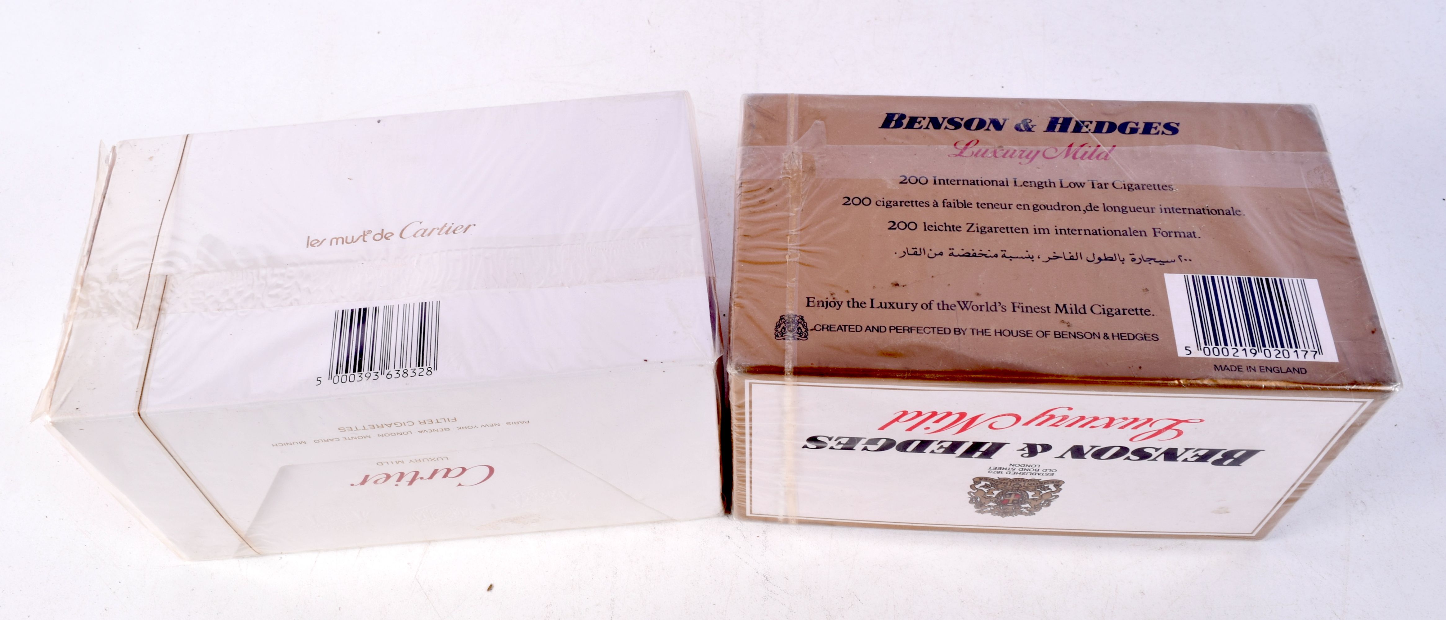 A pack of unopened Cartier cigarettes together with a pack of Benson and Hedges (2). - Bild 2 aus 2