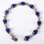AN EARLY 20TH CENTURY CHINESE HONG KONG SILVER AND LAPIS LAZULI BRACELET Late Qing/Republican. 16 gr