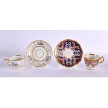 Late 18th /early 19th century teacup and saucer with crack ice gilding around three gilt panels havi