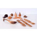 A collection of carved wooden Treen items largest 28 cm (11).