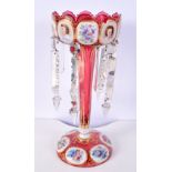 A LARGE 19TH CENTURY BOHEMIAN ENAMELLED RUBY GLASS LUSTRE painted with portraits. 34 cm high.