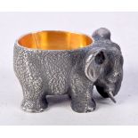 A CONTINENTAL SILVER SALT IN THE FORM OF AN ELEPHANT WITH GILT INTERIOR. Stamped 84, 3cm x 4.8cm x