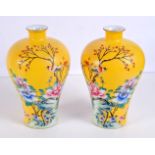 A pair of Chinese porcelain vases decorated with birds and foliage 22 x 14 cm. (2)