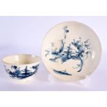 18th century good creamware teabowl and saucer painted in under glaze blue with a Chinese landscape.