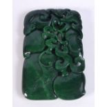 A Carved jade fruiting pod plaque 11 x 7 cm.