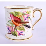Royal Worcester mug with rolled foot painted with a bird by Hopewell date mark for 1883. 7.5cm High