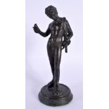 A 19TH CENTURY EUROPEAN GRAND TOUR FIGURE OF A MALE modelled upon a circular base. 14 cm high.