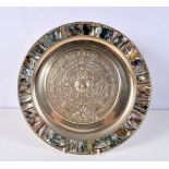 A South American white metal and Abalone shell repoussé wall hanging plaque 28 cm.