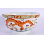 A CHINESE REPUBLICAN PERIOD FAMILLE ROSE DRAGON BOWL bearing Guangxu marks to base. 11 cm diameter.