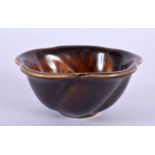 A CHINESE IMITATION AGATE PORCELAIN BOWL 20th Century. 7 cm wide.