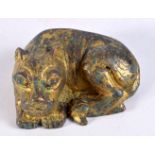 A small Chinese gilt metal dog 3 x 9 cm .