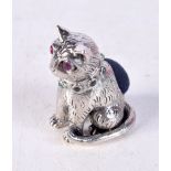 A SILVER CAT PIN CUSHION. 14 grams. 3 cm x 2 cm.