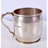 A 1950S SILVER MUG. Sheffield 1956. 112 grams. 10 cm x 7 cm.